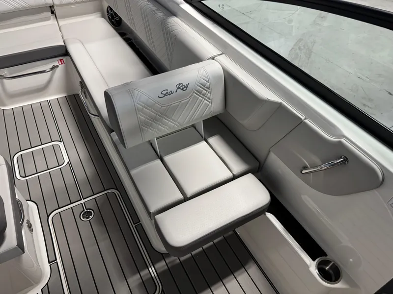 Slide: The Image of 2026 Sea Ray SDX 270 boat interior with luxurious seating and sleek design. - 12
