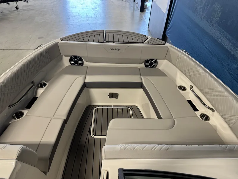 Slide: The Image of 2026 Sea Ray SDX 270 boat interior with spacious seating and modern design. - 18
