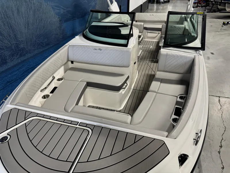 Slide: The Image of 2026 Sea Ray SDX 270 boat interior with spacious seating and modern design. - 19