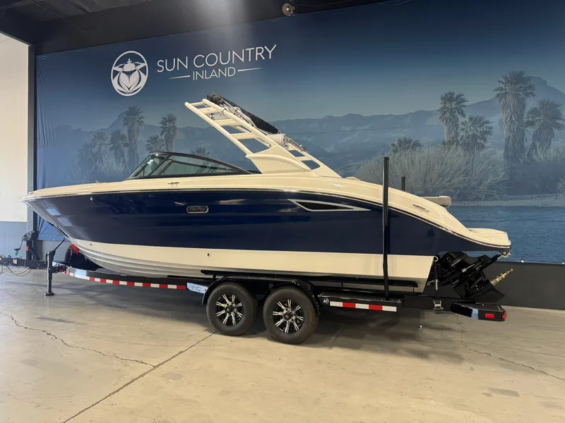 Slide: The Image of 2026 Sea Ray SDX 270 boat on trailer at Sun Country Inland showroom. - 3