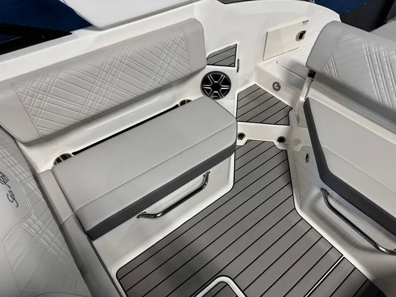 Slide: The Image of Interior of 2026 Sea Ray SDX 270 boat with sleek seating and modern design. - 9
