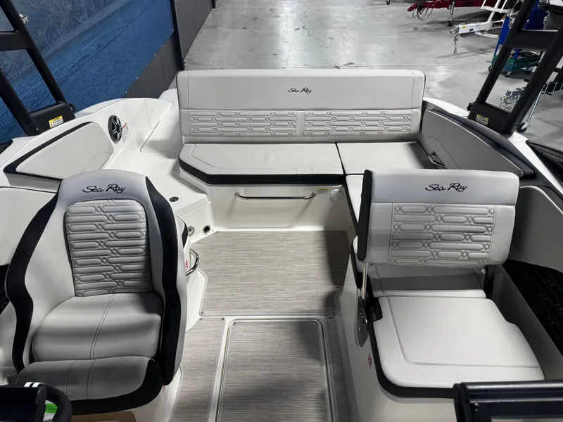 Slide: The Image of 2026 Sea Ray SPX 210 boat interior with luxurious seating and modern design. - 11