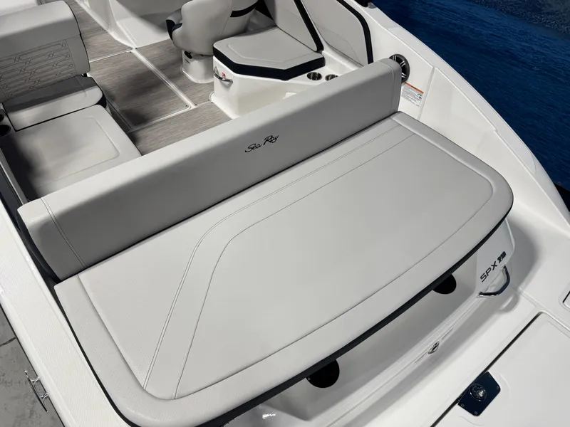 Slide: The Image of 2026 Sea Ray SPX 210 boat interior with sleek seating and modern design. - 6