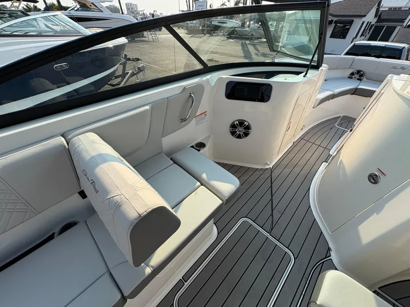 Slide: The Image of 2026 Sea Ray SDX 250 boat interior with sleek seating and modern design. - 4