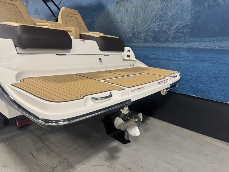 Slide: The Image of 2026 Sea Ray SDX 290 boat stern with swim platform and propeller. - 4
