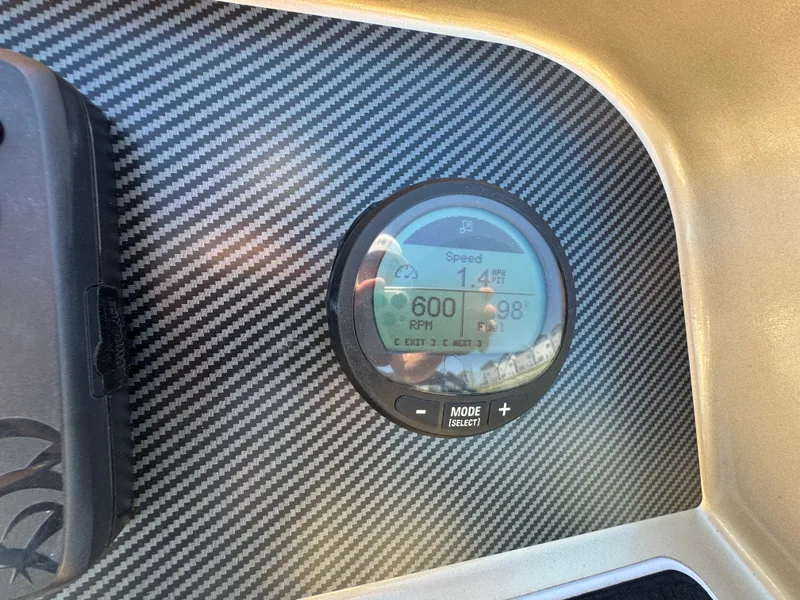 Slide: The Image of Dashboard of 2023 Massimo Marine P24 with digital display and carbon fiber texture. - 21