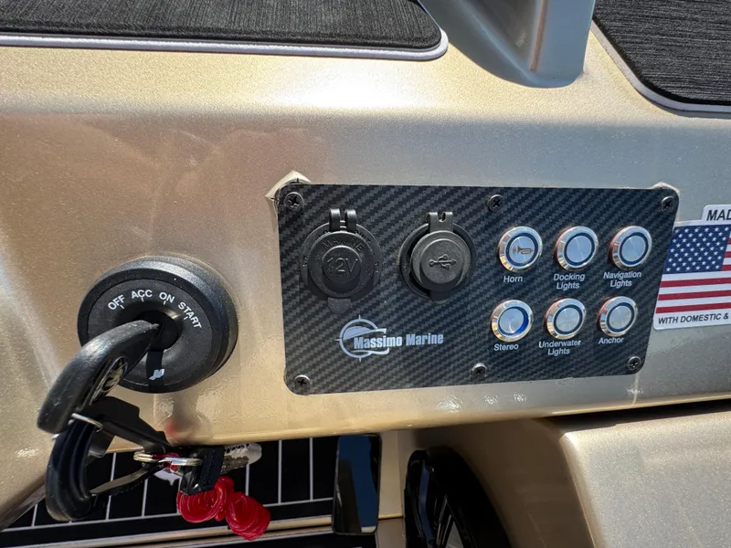 Slide: The Image of Control panel of 2023 Massimo Marine P24 boat with ignition and switches. - 22