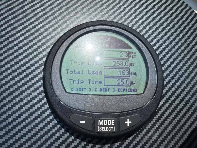 Slide: The Image of Digital display on Massimo Marine P24 boat dashboard, showing trip data and settings. - 29