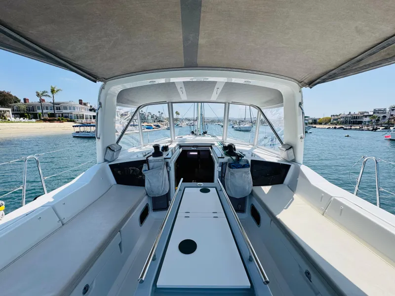 Slide: The Image of Beneteau Oceanis 41.1 sailboat cockpit, 2020 model, docked near a scenic waterfront. - 17