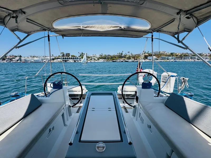 Slide: The Image of Cockpit view of 2020 Beneteau Oceanis 41.1 sailboat on a sunny day at sea. - 19