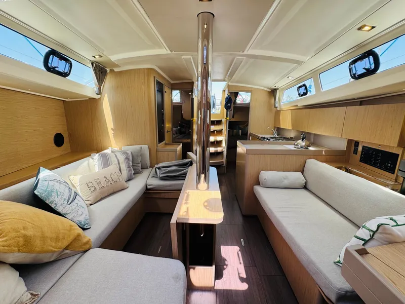 Slide: The Image of Luxurious interior of 2020 Beneteau Oceanis 41.1 yacht with modern furnishings and ample natural light. - 30