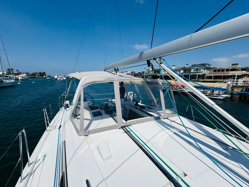 Slide: The Image of Beneteau Oceanis 41.1 sailboat, 2020 model, docked in a sunny marina. - 4