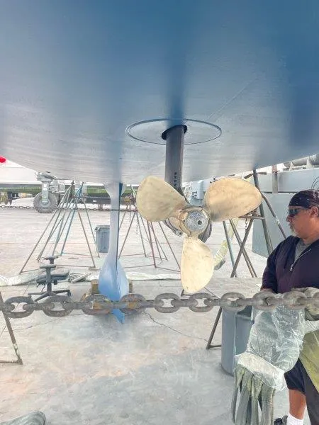 Slide: The Image of Beneteau Oceanis 41.1 sailboat propeller and keel, 2020 model, in dry dock. - 49