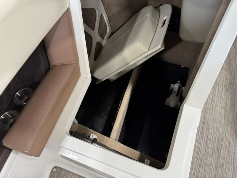 Slide: The Image of Interior storage compartment of a 2012 Cobalt 296 BR boat. - 14
