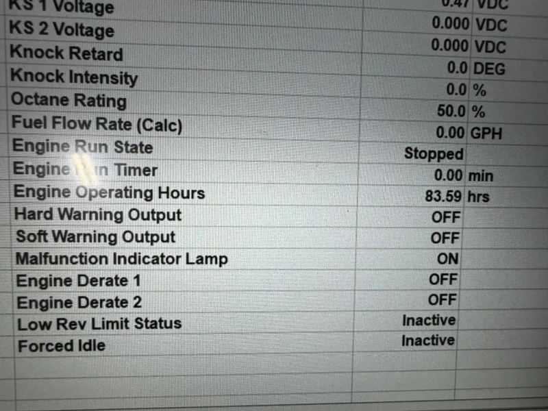 Slide: The Image of Display screen showing engine diagnostics for 2012 Cobalt 296 BR, including operating hours and warning statuses. - 15