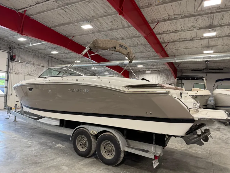 Slide: The Image of 2012 Cobalt 296 BR boat on trailer in indoor storage facility. - 3