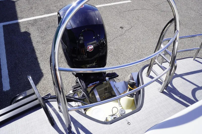 Slide: The Image of 2025 Lowe SS 230 DL boat engine and railing detail. - 21