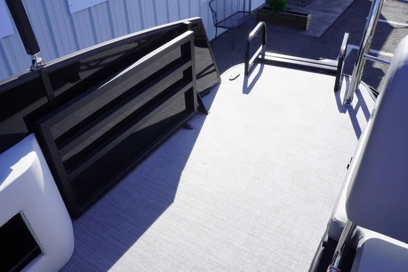 Slide: The Image of 2025 Lowe SS 230 DL boat deck with sleek design and modern features. - 22