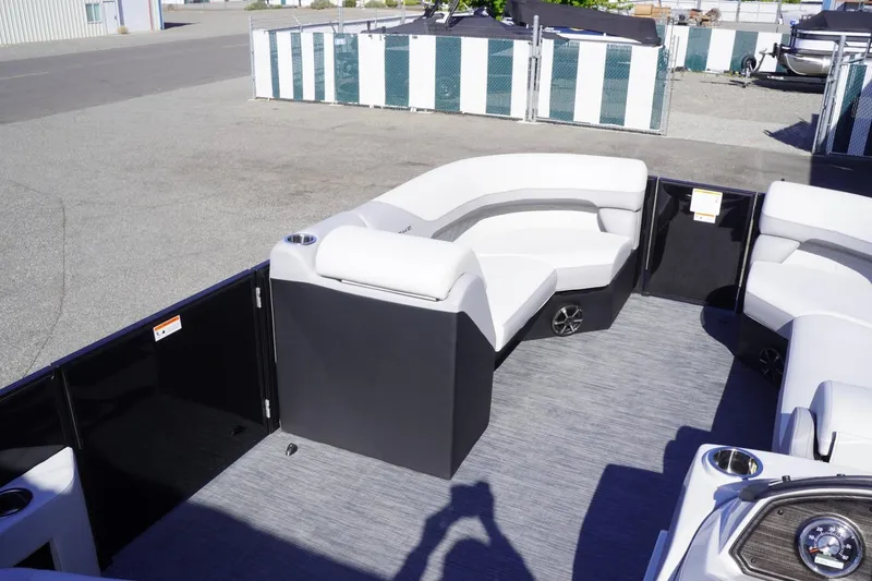 Slide: The Image of 2025 Lowe SS 230 DL pontoon boat with spacious seating and modern design. - 28