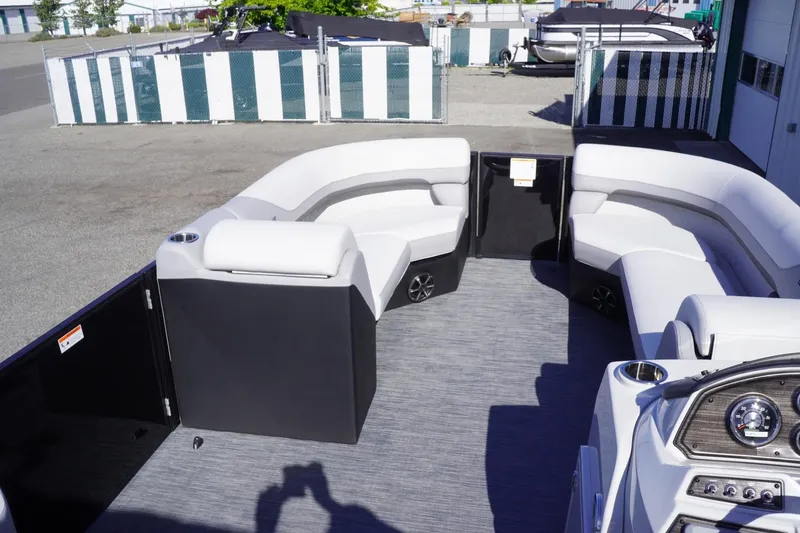 Slide: The Image of 2025 Lowe SS 230 DL pontoon boat interior with spacious seating and modern design. - 29