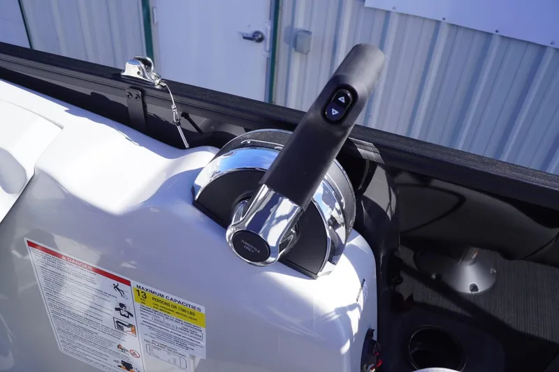 Slide: The Image of Control lever of 2025 Lowe SS 230 DL boat, featuring ergonomic design and modern functionality. - 34