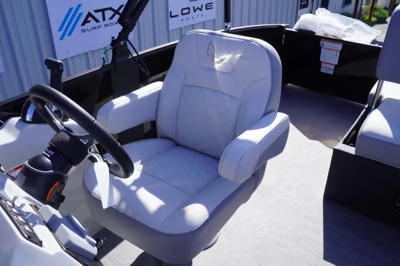 Slide: The Image of Captain's chair in 2025 Lowe SS 230 DL boat, featuring a sleek design and comfortable seating. - 37