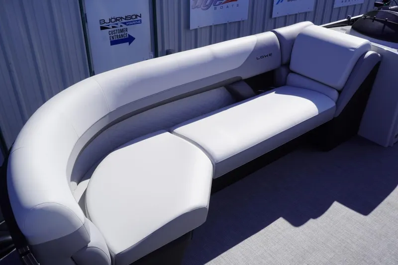 Slide: The Image of Luxurious seating on a 2025 Lowe SS 230 DL pontoon boat, featuring sleek, modern design. - 40