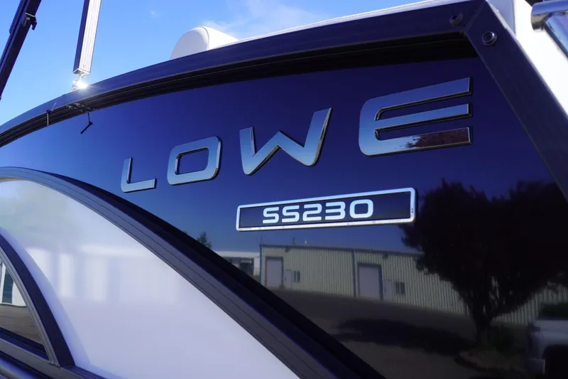 Slide: The Image of 2025 Lowe SS 230 DL boat exterior with logo and model name. - 6