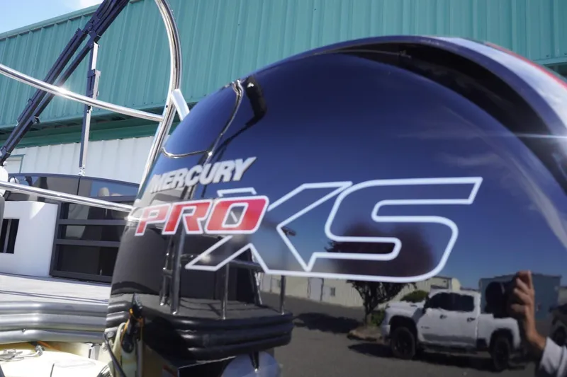 Slide: The Image of Mercury Pro XS engine on 2025 Lowe SS 230 DL boat, outdoor setting. - 7