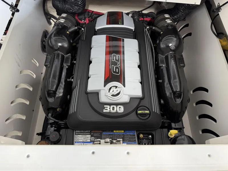 Slide: The Image of 2024 Sea Ray SPX230 engine compartment featuring a powerful 6.2L Mercury engine. - 21