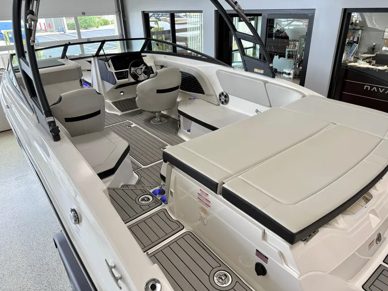 Slide: The Image of 2024 Sea Ray SPX230 boat interior with modern seating and sleek design. - 24