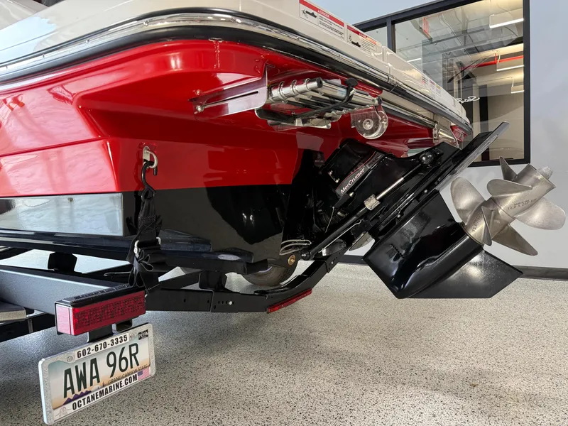 Slide: The Image of 2024 Sea Ray SPX230 boat stern with propeller and Arizona license plate. - 6