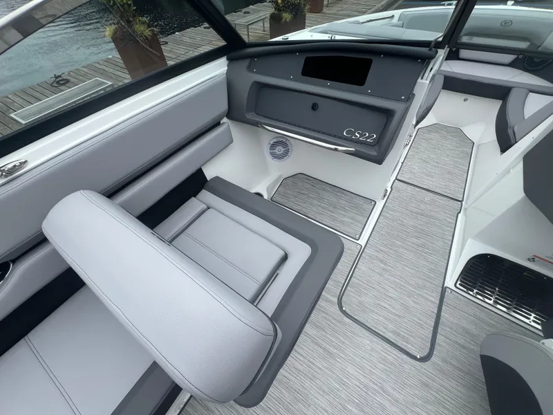Slide: The Image of 2023 Cobalt CS22 boat interior with sleek seating and modern design. - 15