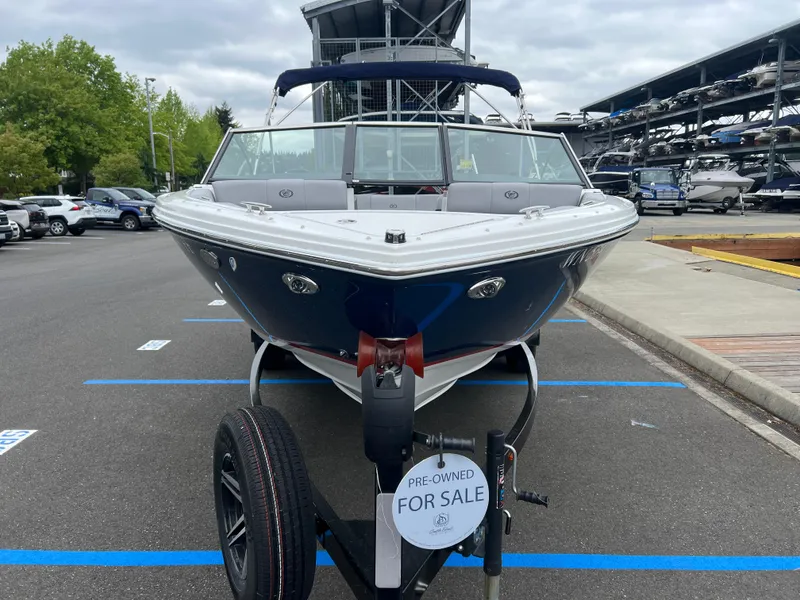 Slide: The Image of 2023 Cobalt CS22 boat for sale in parking lot, pre-owned condition. - 3