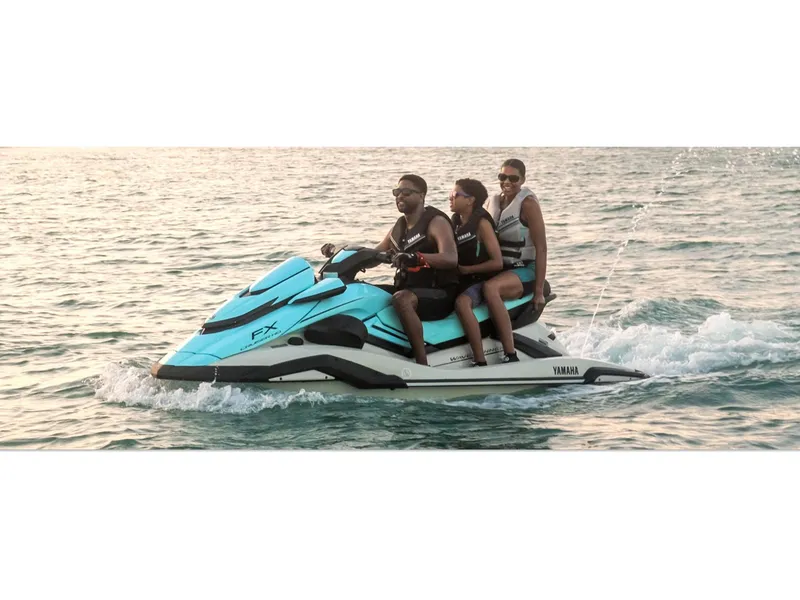 Slide: The Image of 2025 Yamaha FX Cruiser HO with Audio, three people riding on a calm sea. - 7