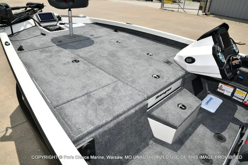 Slide: The Image of 2025 Ranger RT198P Cup Equipped boat interior with carpeted deck and control console. - 11