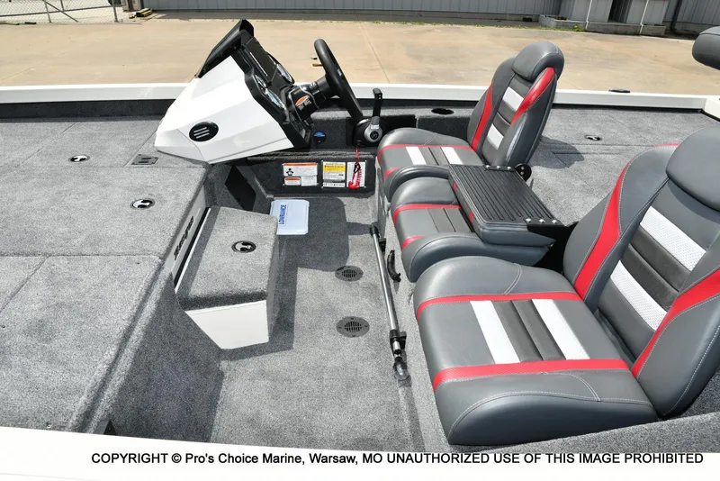 Slide: The Image of 2025 Ranger RT198P Cup Equipped boat interior with modern seating and control panel. - 12
