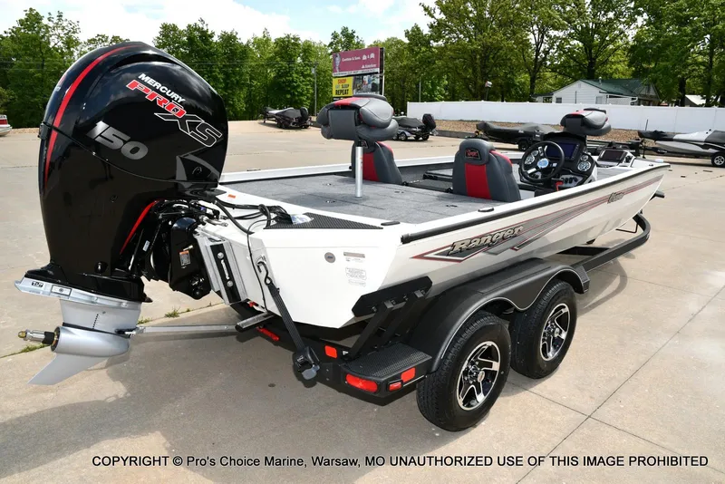 Slide: The Image of 2025 Ranger RT198P Cup Equipped boat with Mercury 150 Pro XS engine, parked outdoors. - 15