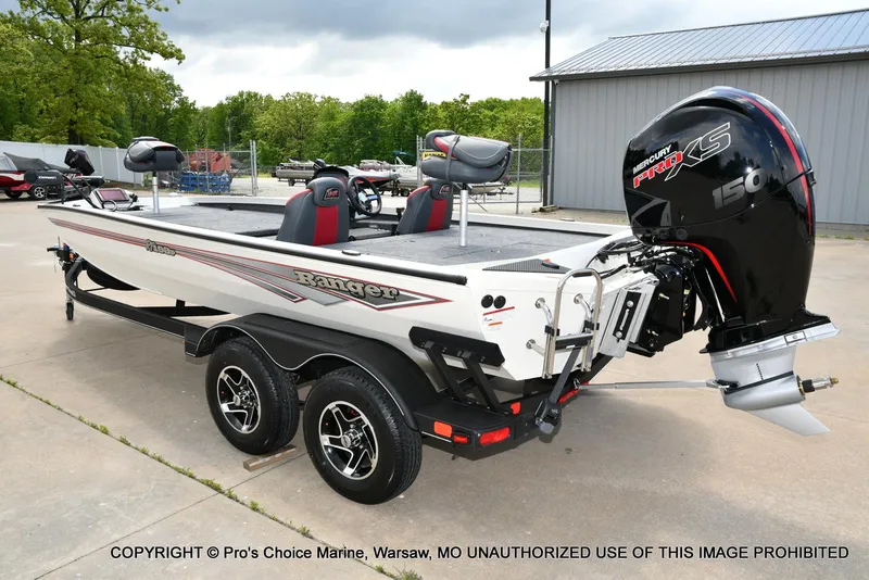 Slide: The Image of 2025 Ranger RT198P Cup Equipped boat with Mercury Pro XS 150 engine, parked outdoors. - 20