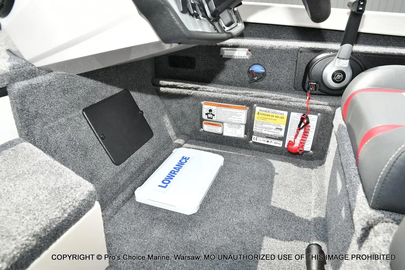 Slide: The Image of Interior of 2025 Ranger RT198P Cup Equipped boat with control panel and safety labels. - 38