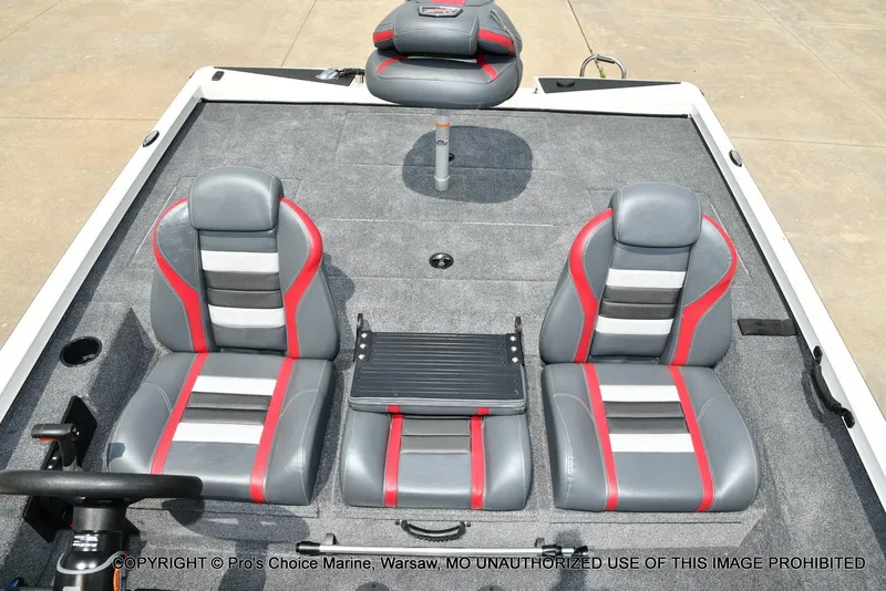 Slide: The Image of 2025 Ranger RT198P Cup Equipped boat interior with gray and red seats. - 46
