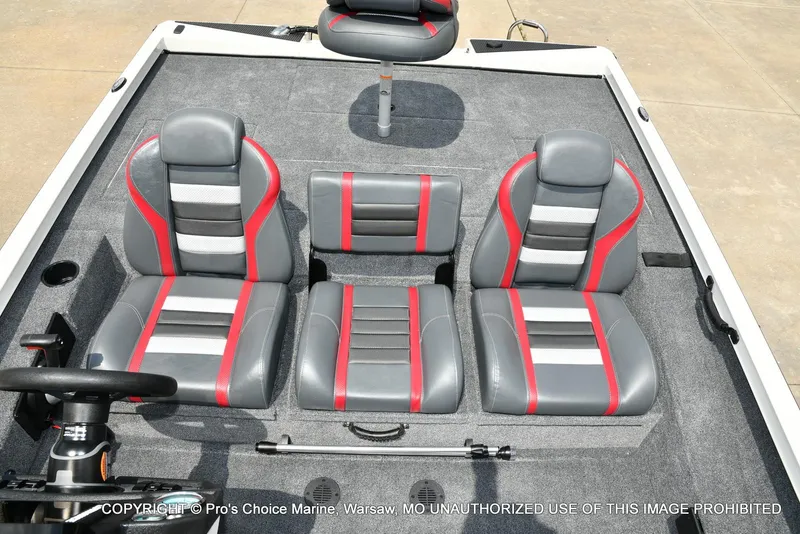 Slide: The Image of 2025 Ranger RT198P Cup Equipped boat interior with gray and red seats. - 47