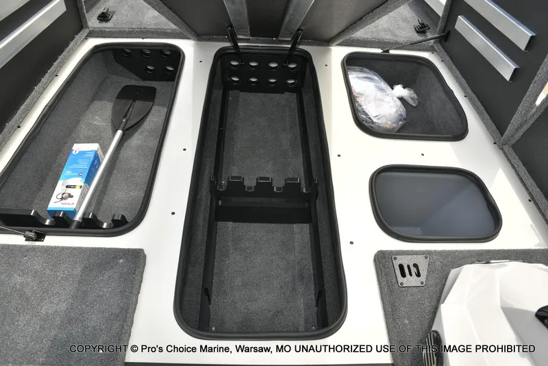 Slide: The Image of 2025 Ranger RT198P Cup Equipped boat storage compartments with paddle and accessories. - 49
