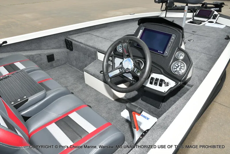 Slide: The Image of 2025 Ranger RT198P Cup Equipped boat interior with steering wheel and dashboard controls. - 5