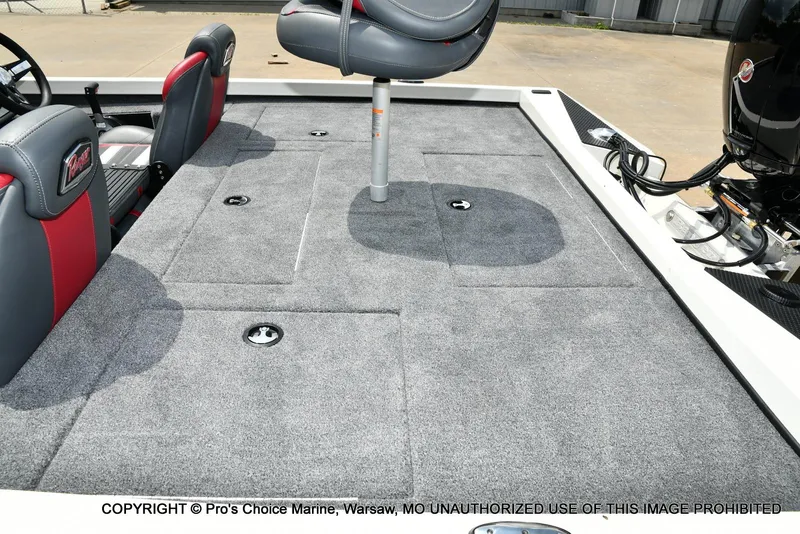 Slide: The Image of 2025 Ranger RT198P Cup Equipped boat interior with gray carpet and seating. - 64