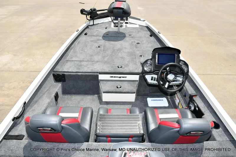 Slide: The Image of 2025 Ranger RT198P Cup Equipped boat interior with steering wheel and seating. - 7