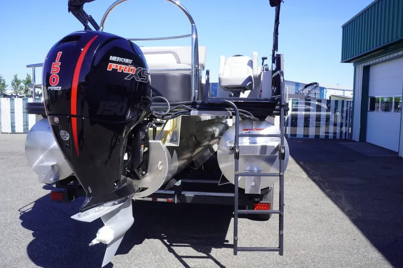 Slide: The Image of 2025 Lowe SS 230 DL pontoon boat with Mercury 150 Pro XS engine, rear view. - 13