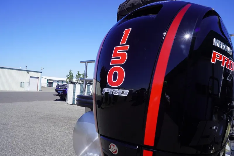 Slide: The Image of Outboard motor on a 2025 Lowe SS 230 DL boat, featuring "150 PRO" branding. - 15