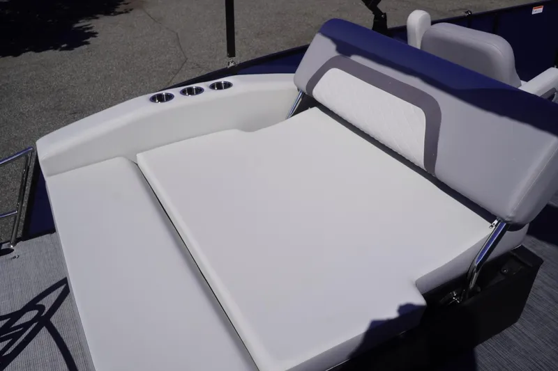 Slide: The Image of 2025 Lowe SS 230 DL boat with comfortable seating and cup holders. - 17