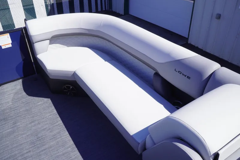 Slide: The Image of Luxurious seating on 2025 Lowe SS 230 DL pontoon boat, featuring sleek, modern design. - 21
